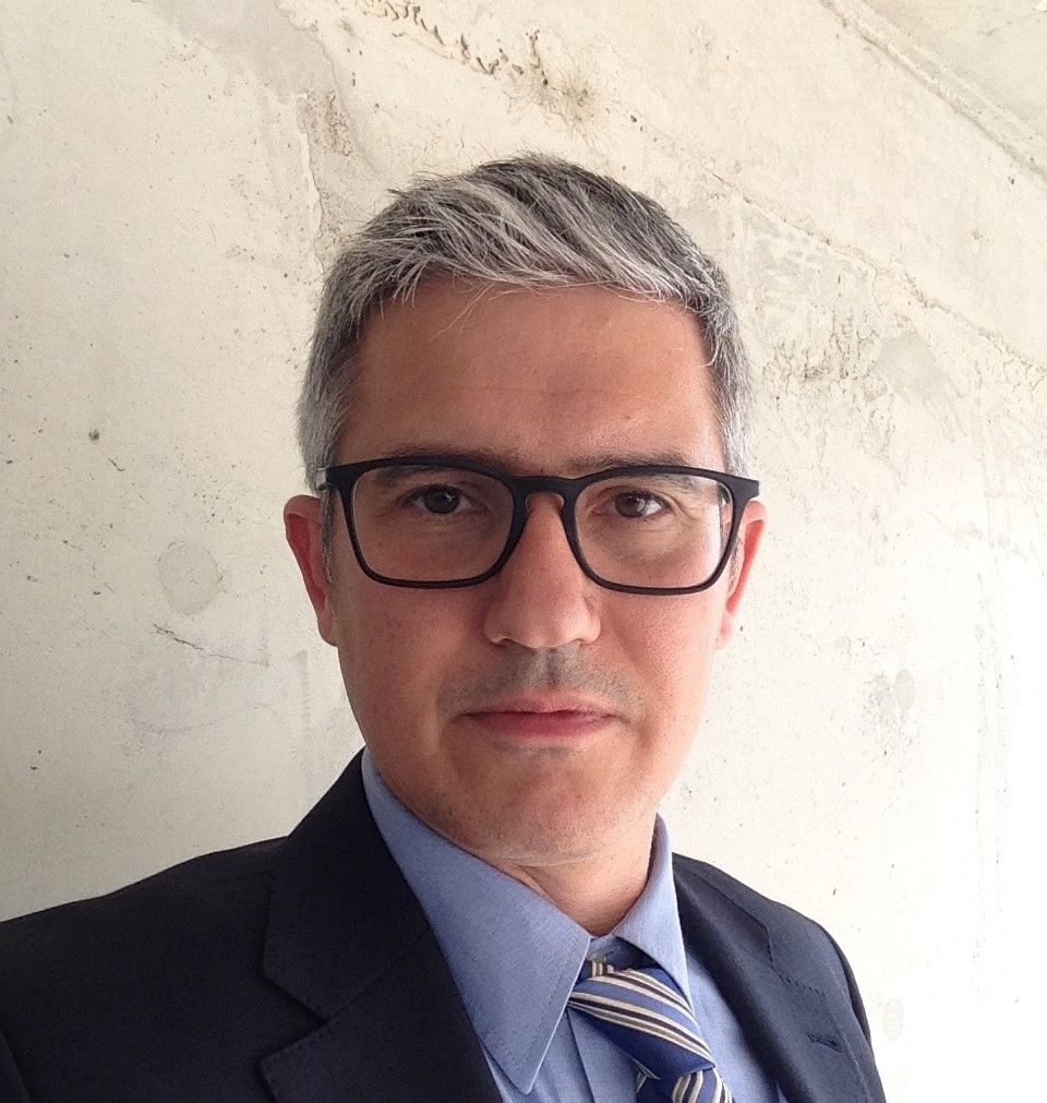 The picture of Axi blog author Alex Macris